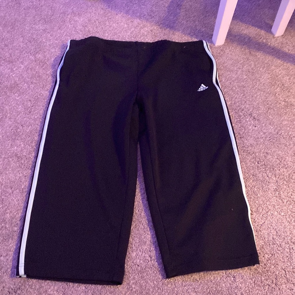 Adidas’s short sweat pants with teal lines on the side size XL woman’s